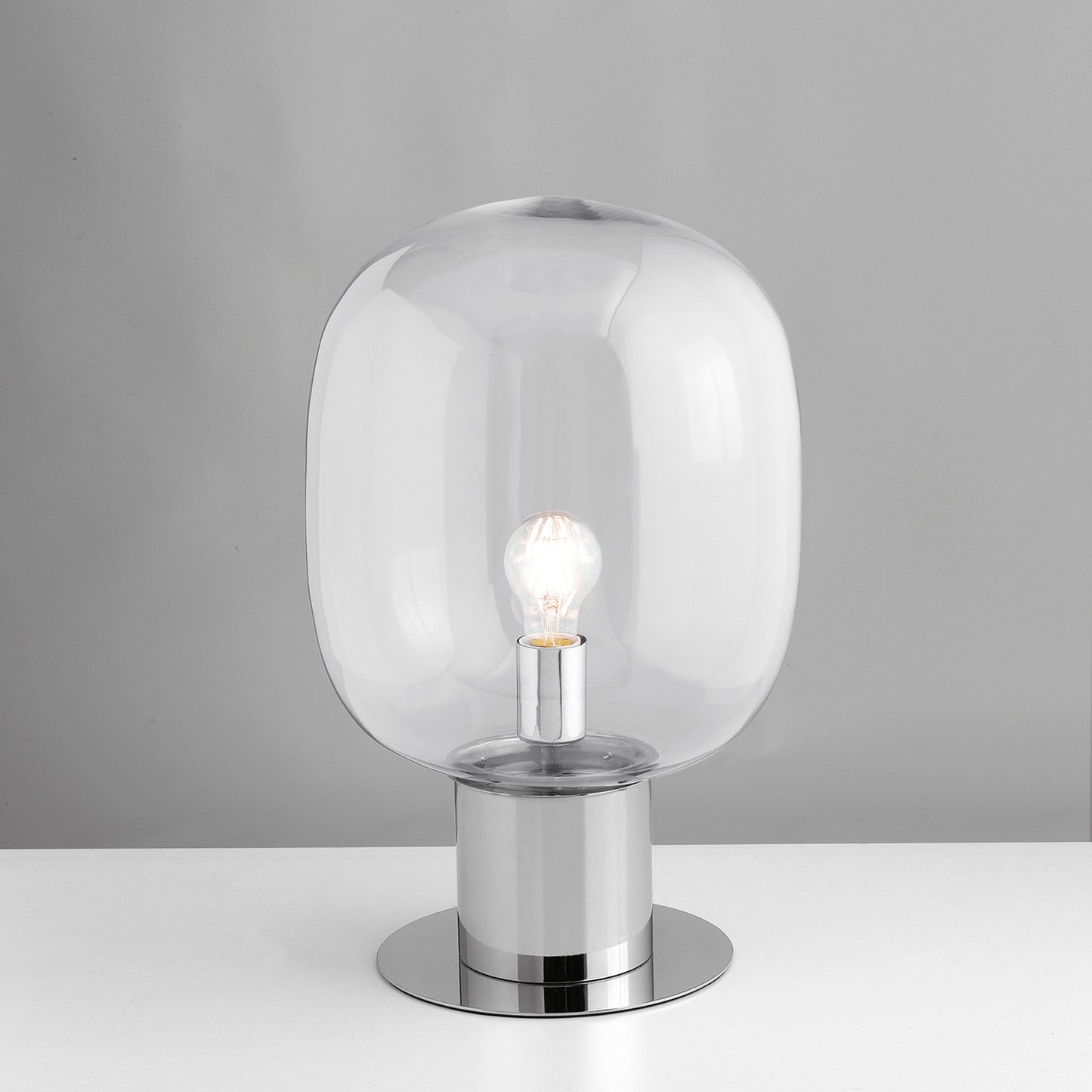 Lampada da tavolo FELLINI in metallo cromato con diffusore in vetro 30 cm.