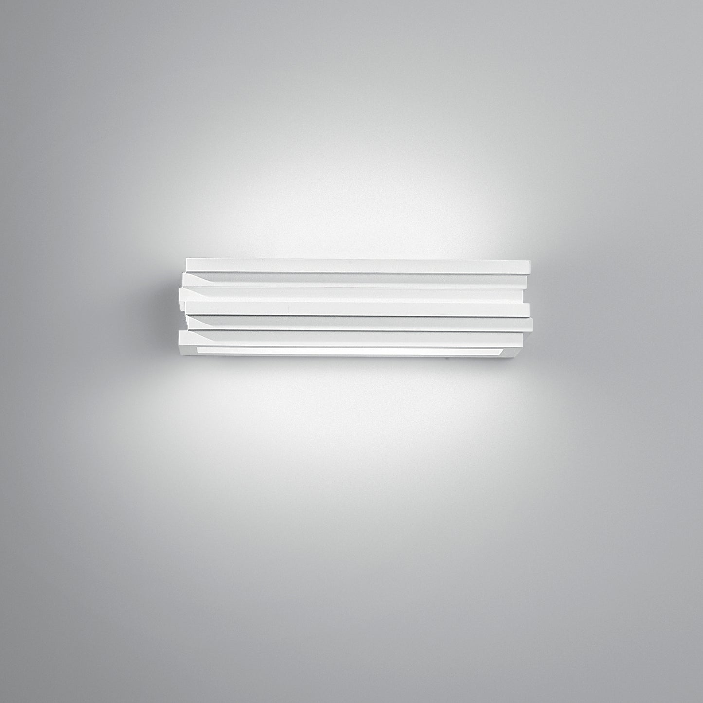 Applique FLOW rettangolare in gesso verniciabile con luce biemissione.