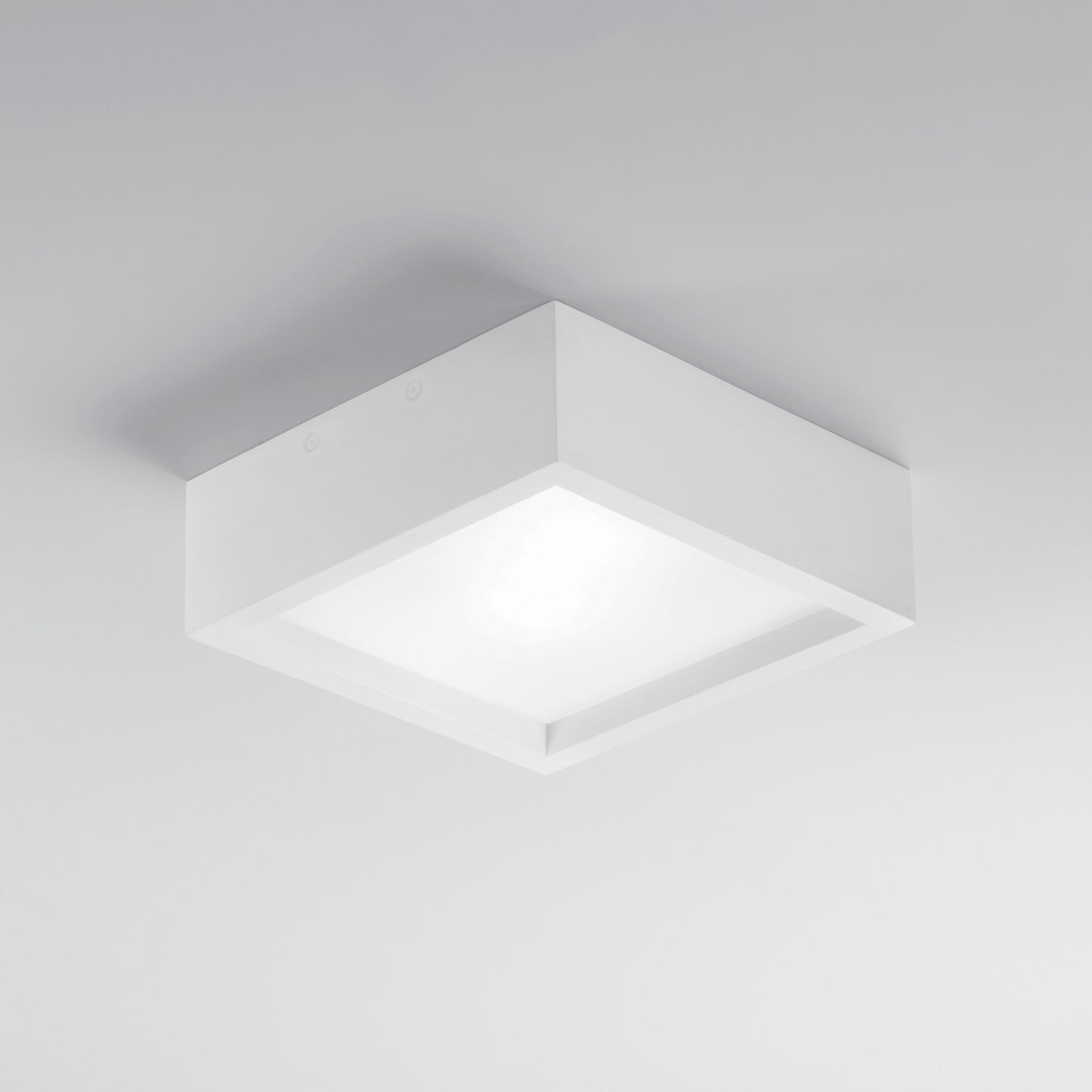 Plafoniera GABRIEL quadrata in gesso bianco verniciabile con diffusore in vetro