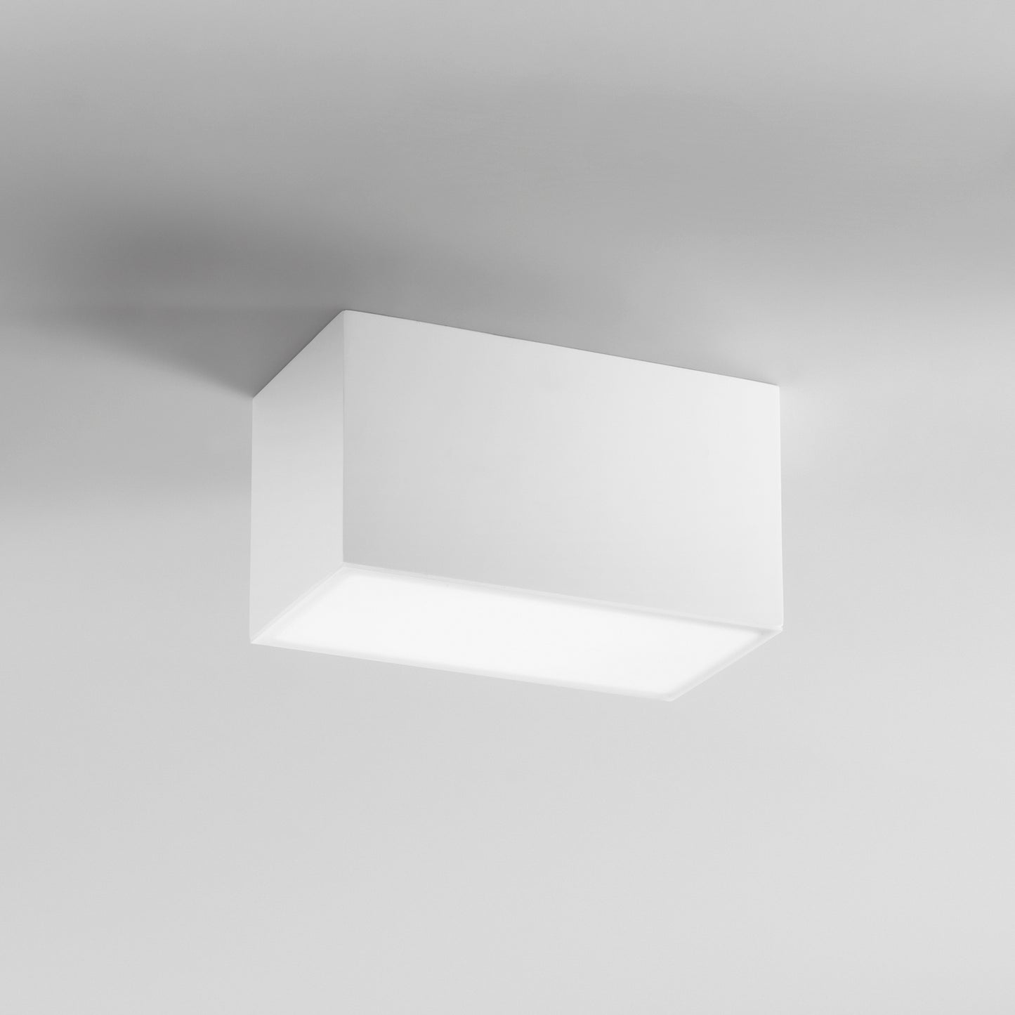 Plafoniera LIVING rettangolare in gesso bianco verniciabile h13 x 23 cm.