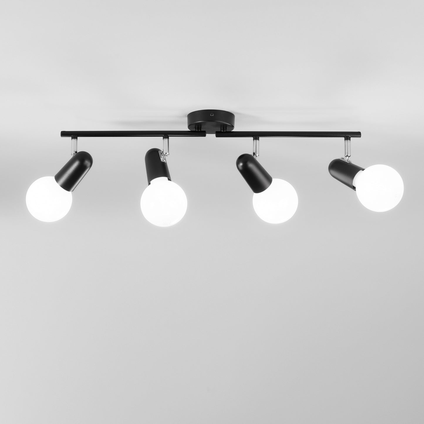 Spot PUNTO in metallo nero con 4 punti luce orientabili