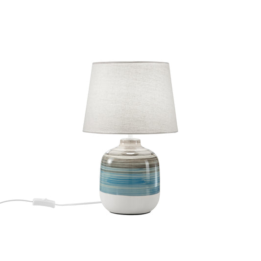 Lume APACHE con base in ceramica e paralume in tessuto bianco.