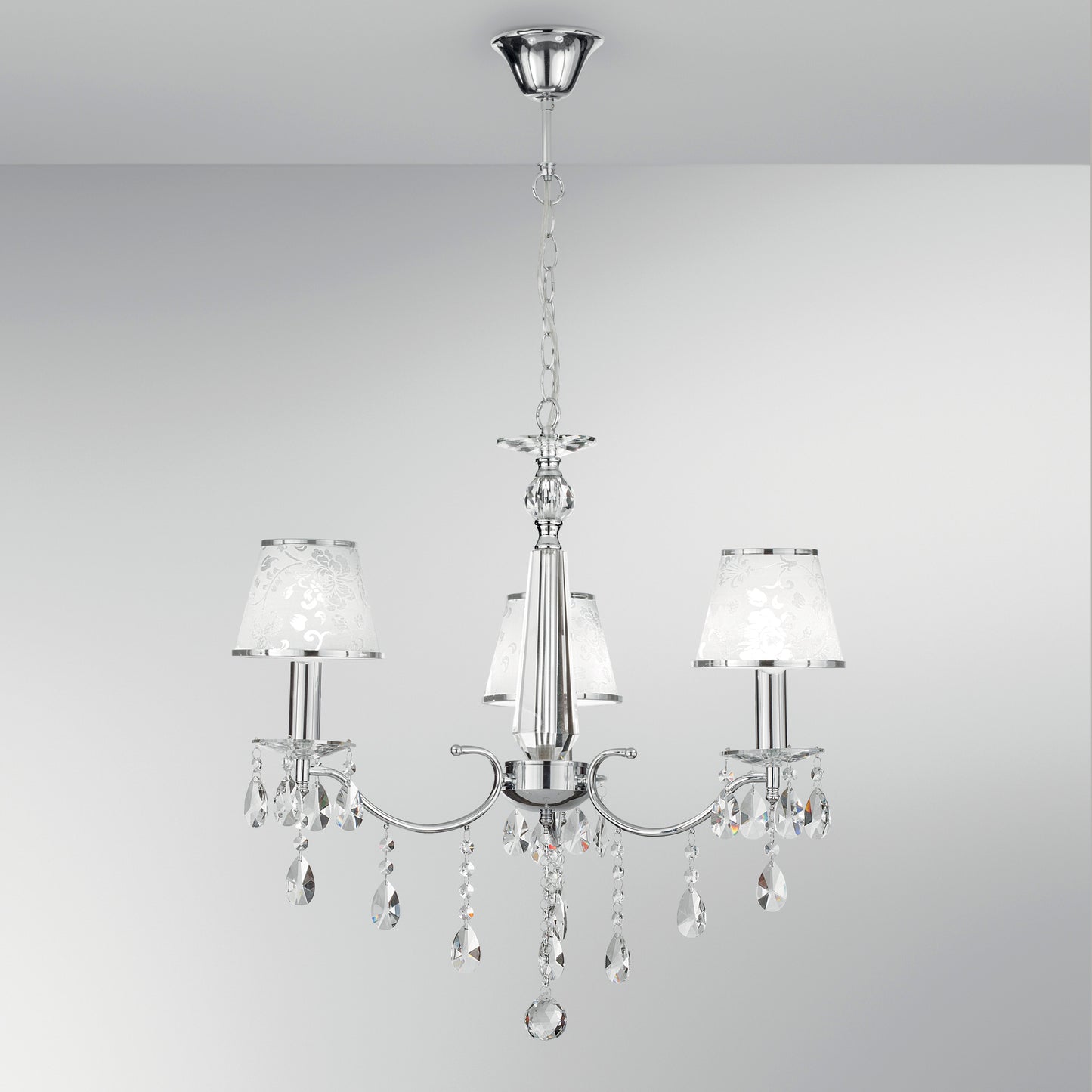 Lampadario BOEME in metallo cromato e cristalli con tre paralumi glitterati