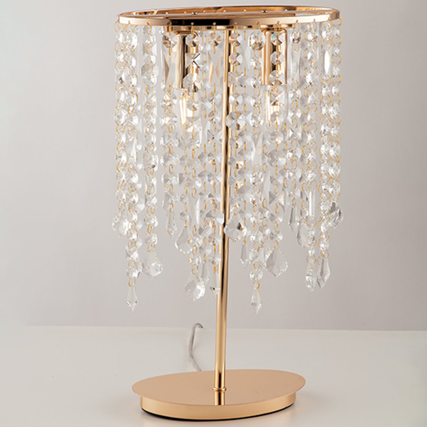 Lampada da tavolo BREEZE in metallo oro con pendenti in cristallo