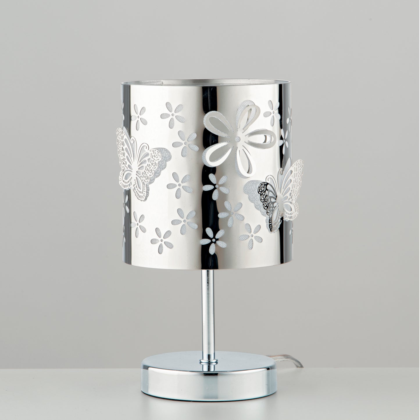 Lampada da tavolo BUTTERFLY in acciaio cromato con decorazione laser