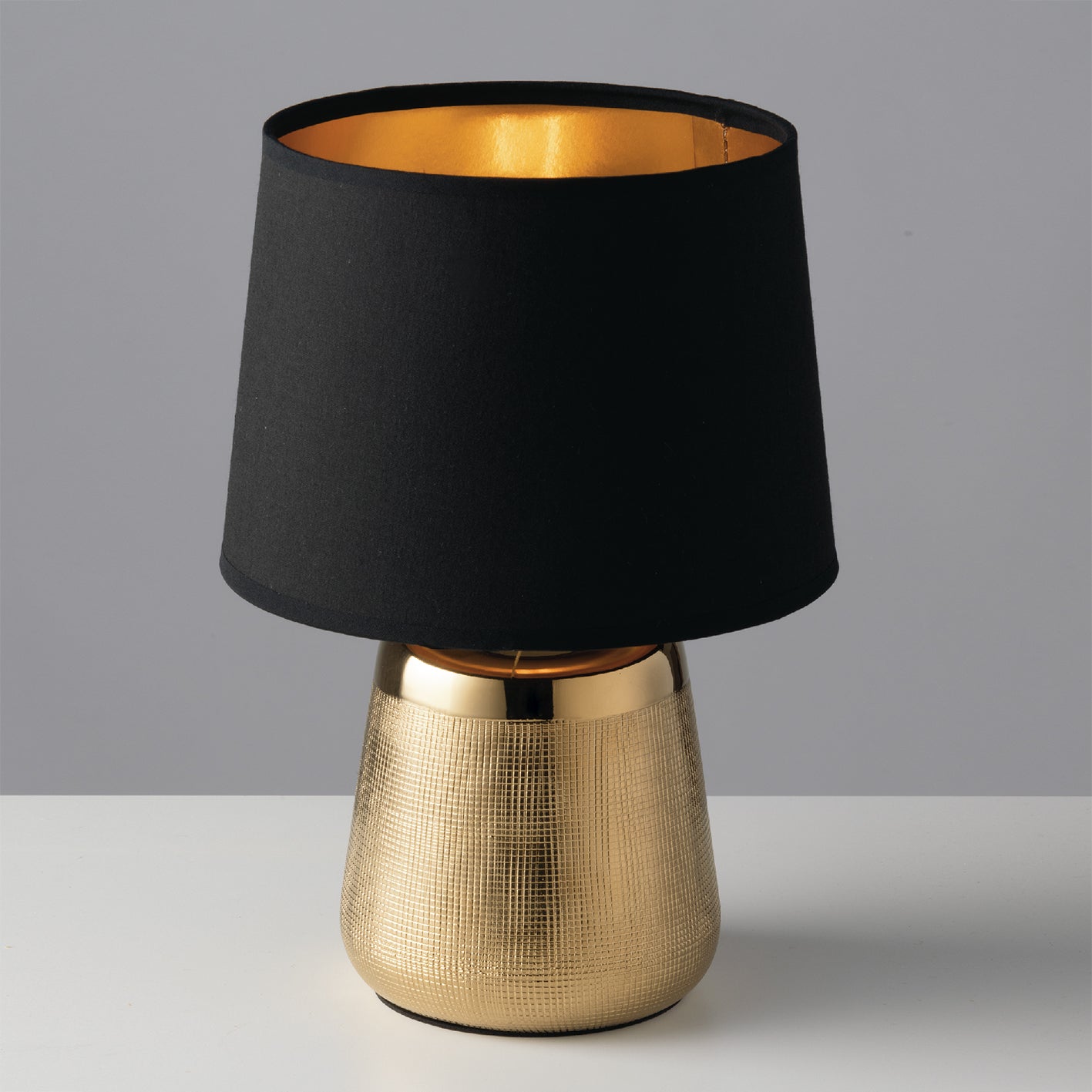 Lampada da tavolo ECSTASY in ceramica oro e paralume in tessuto nero
