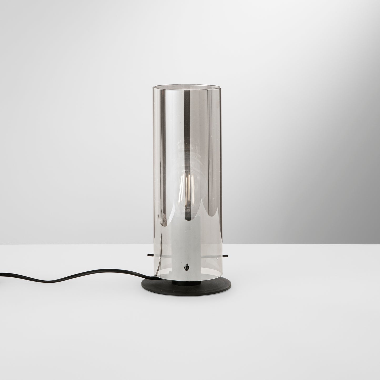 Lampada da tavolo MAGIC in metallo nero e diffusore in vetro fumè