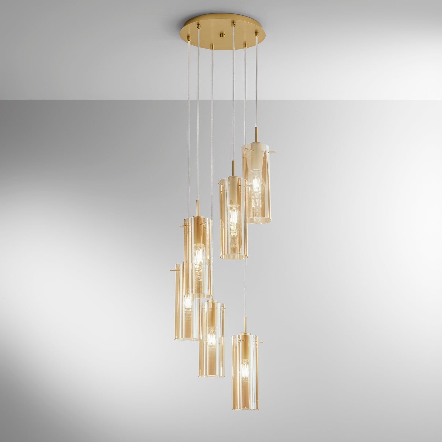 Sospensione MAGIC in metallo oro con 6 diffusori vetro ambrato