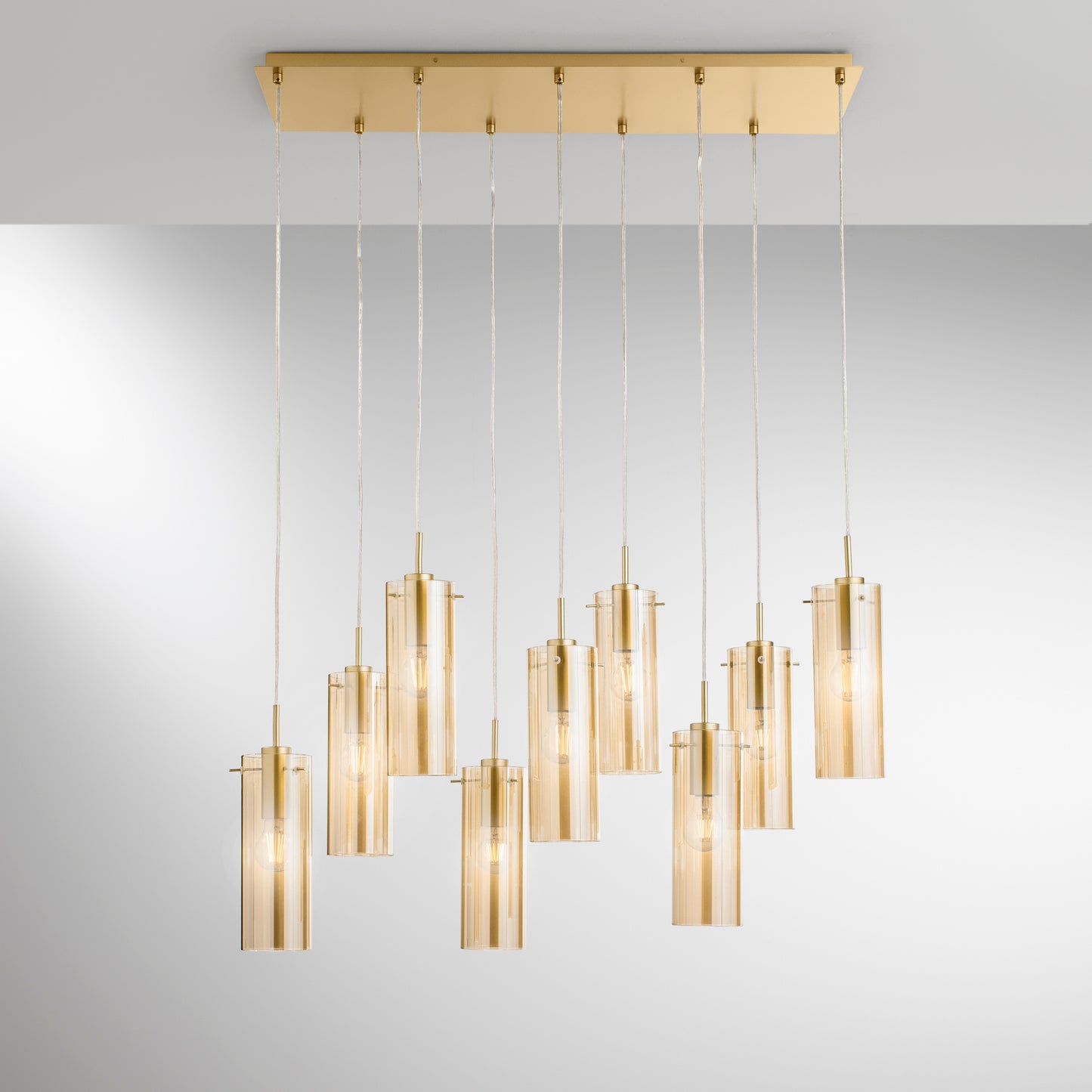 Sospensione MAGIC in metallo oro con 9 diffusori vetro ambrato