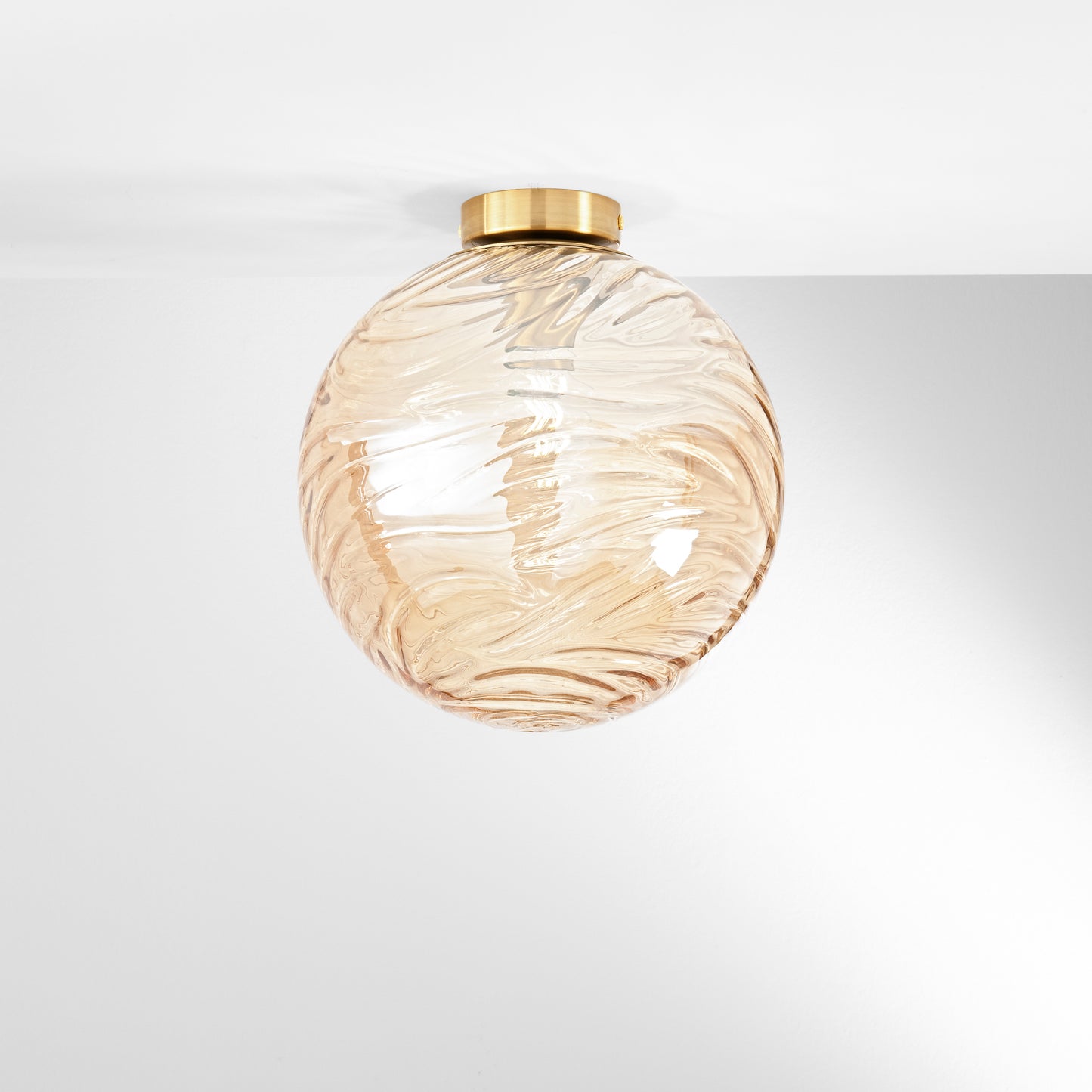 Plafoniera NEREIDE in vetro champagne ad onde concentriche Ø 30 cm.