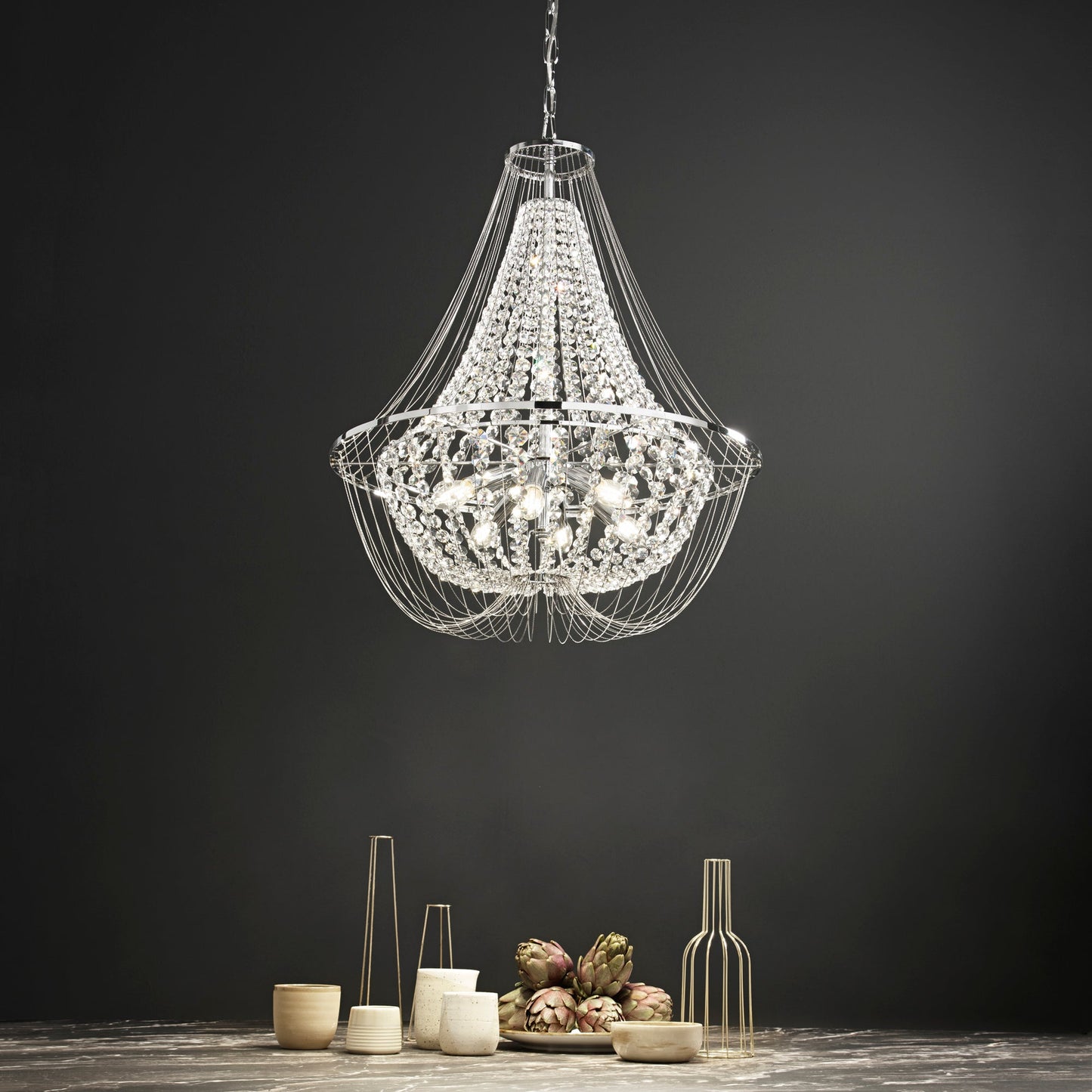 Lampadario a sospensione VIENNA in metallo cromato con cristalli h 120cm. Ø 60cm.