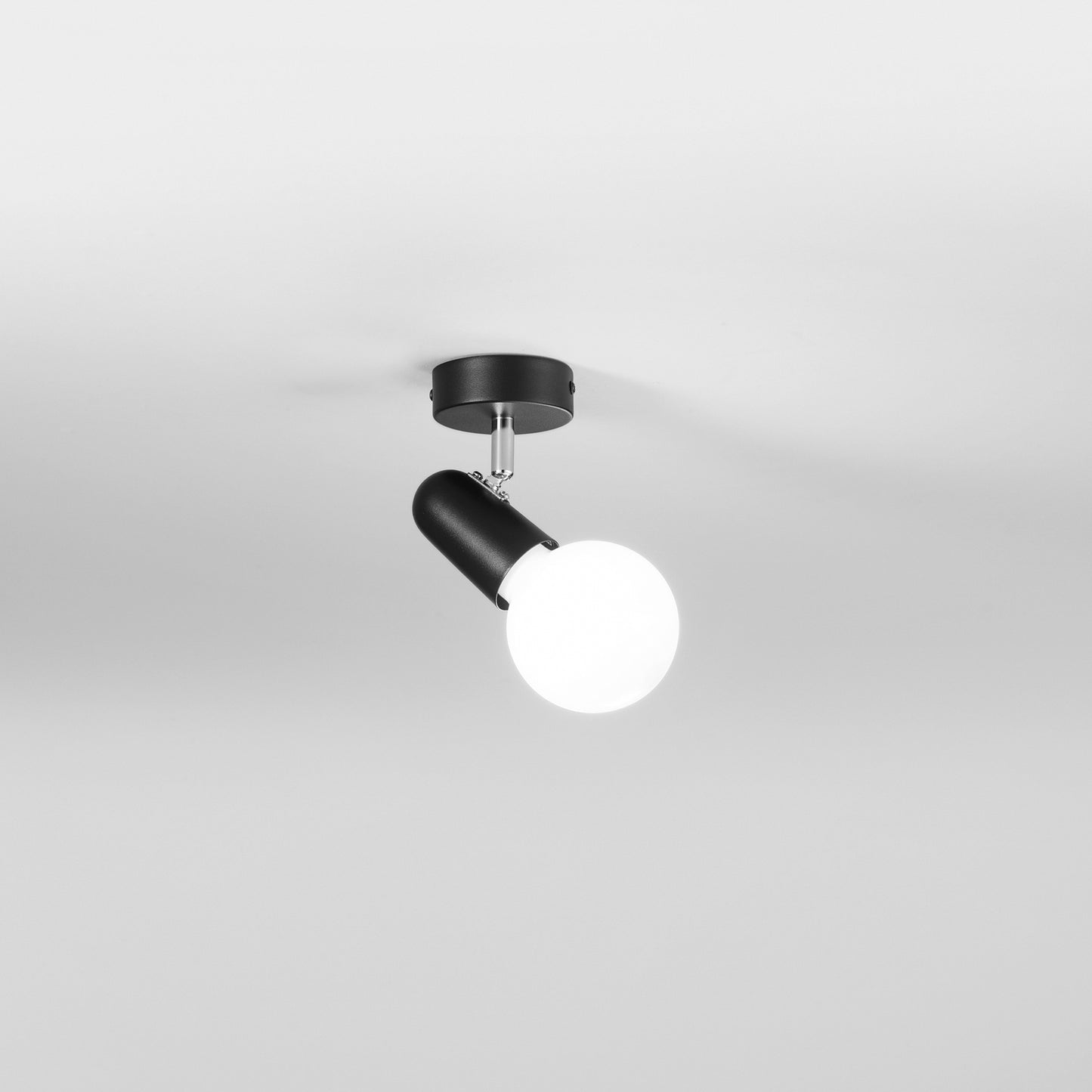 Spot PUNTO in metallo nero con punto luce orientabile