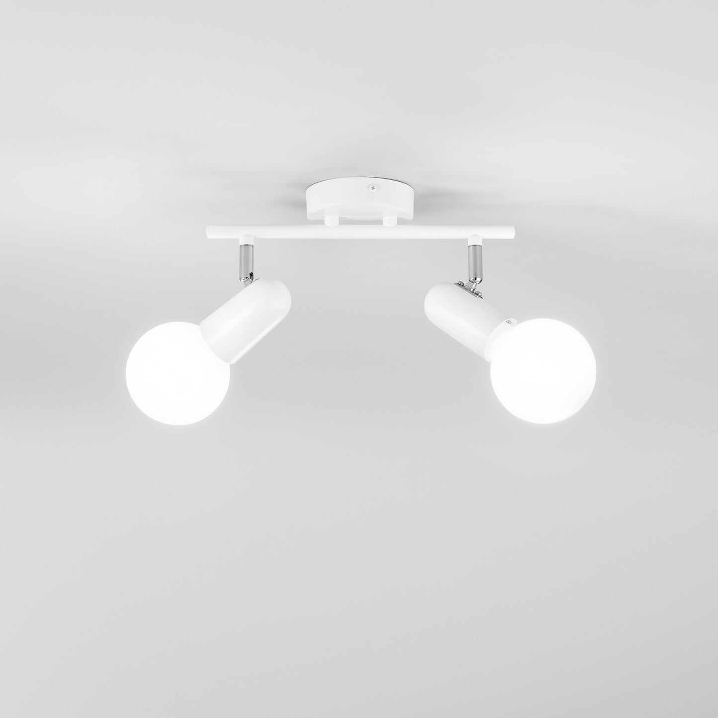 Spot PUNTO in metallo bianco con 2 punti luce orientabili