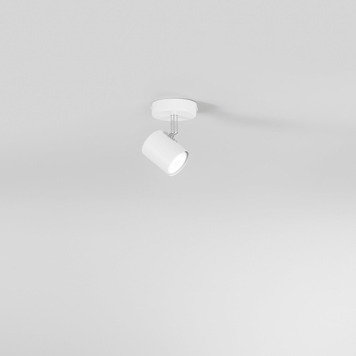 Spot ZERO in metallo bianco con 1 punto luce orientabile