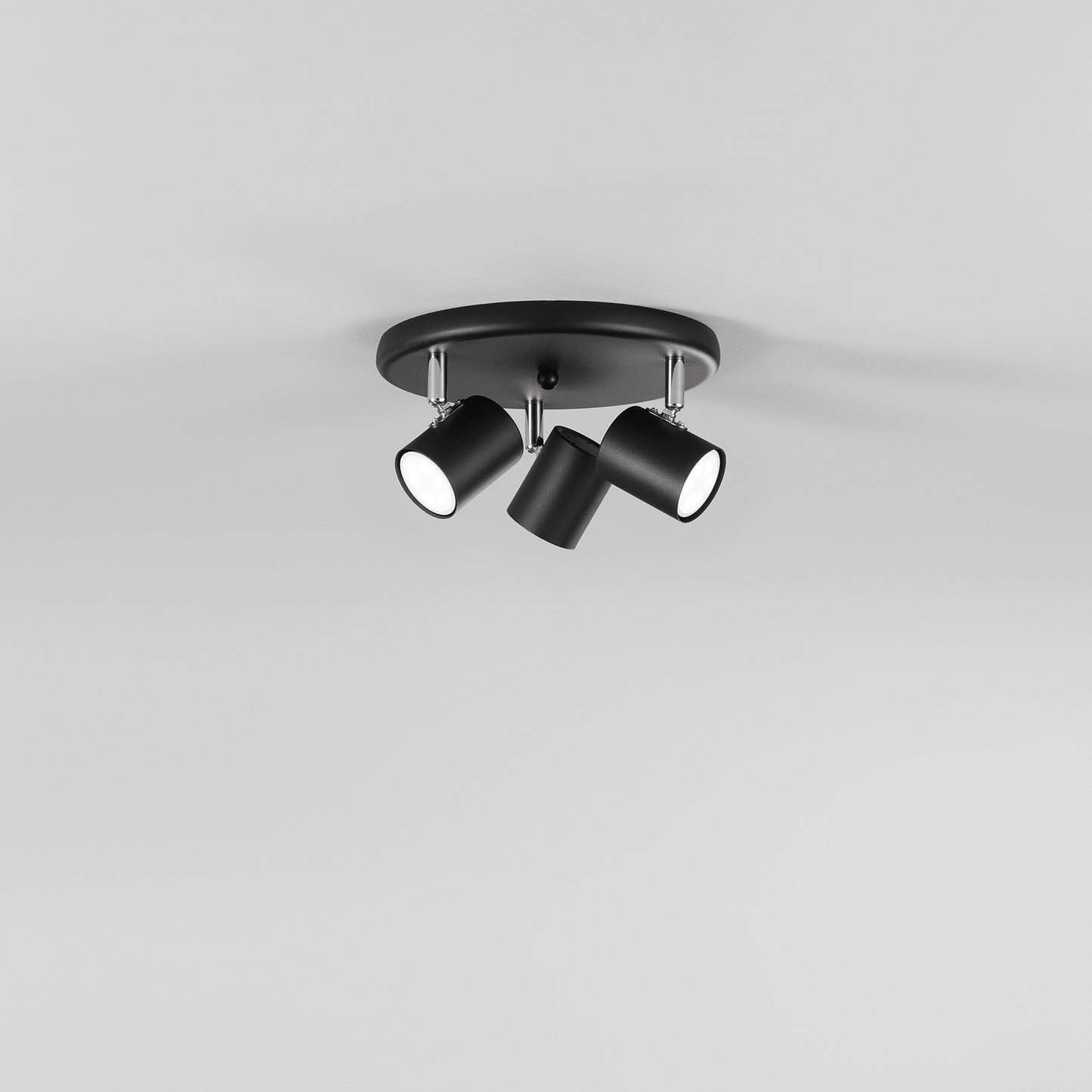 Spot ZERO in metallo nero con 3 punti luce orientabili